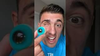 WEARING A GUMMY EYEBALL 