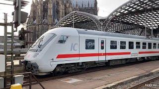 DB IC met rode rijtuigen + 101 078 achterop vertrekt uit Keulen Hbf