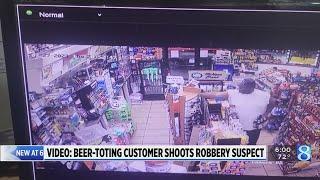 Video Beer-toting customer shot at robbery suspect 7 times