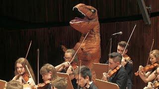 T-rex in Jurassic Park Theme by John Williams Zebrowski Music School Orchestra