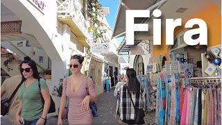 Fira Santorini walking tour. Streetsshops and sunset