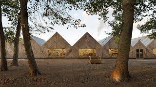 Tracks Architectes design kindergarten in France as a run of pitched forms