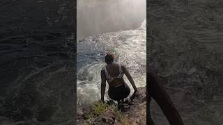 Wow unbelievable waterfall  Scared to fall over Victoria Falls. #travel #fyp #fun #adventure
