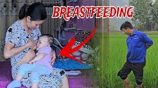 Single father takes his child to breastfeed and work in the fields