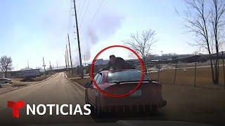 En video Persecución con policía aferrado al techo del auto  Noticias Telemundo