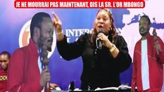 MAMAN LOR MBONGO DENONCE CE FAUX PROPHETE MOISE  QUI AVAIT PRÉDIT SA MALADIE ET SA MORT. .