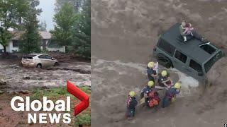 Arizona floods Dramatic videos show car washed away family rescued atop vehicle