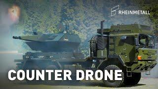 Rheinmetall Air Defence Skynex truck-mounted engaging drone swarm