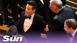 Oscars 2019 Rami Malek falls off stage video