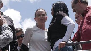 Venezuelan opposition leader Maria Corina Machado rides toward anti-Maduro election protest  AFP