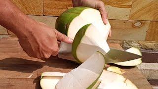 Peel coconut easily using a sharp knife  Coconut Cutting Skill  Fruit cutting