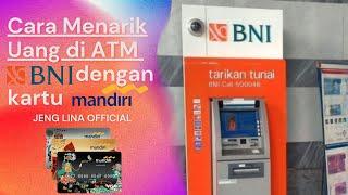 Cara menarik uang di ATM BNI menggunakan kartu ATM Mandiri 2022