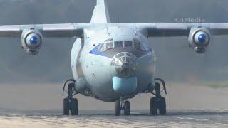 Antonov An-12 smoky Soviet 53-year-old aircraft after takeoff and landing RF-95684