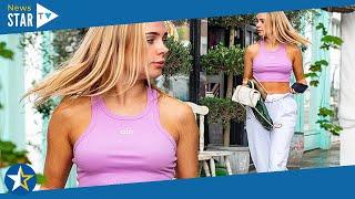 Kimberley Garner shows off her taut abs and impressively svelte figure in pink cropped yoga top 9770