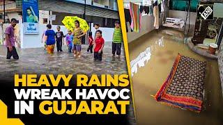 Gujarat Rain water enters houses disrupts normal life in Ahmedabad