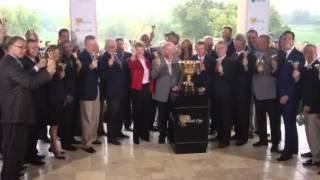 Jack Nicklaus rings the New York Stock Exchange opening bell to mark beginning of The Presidents Cup