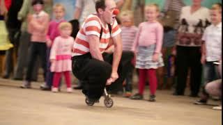 clown riding a small bike in akvamarine circus on november 11 2012 in moscow russia