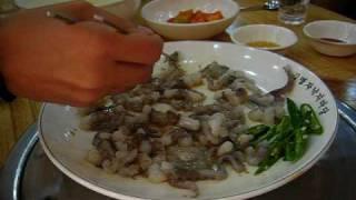 Eating Sannakji live octopus in South Korea