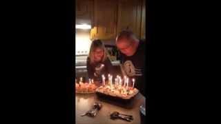 Little girls hair catches on fire blowing out candles