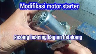 Modifikasi dinamomotor starter pasang bearing as bagian belakang.