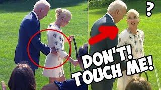 Joe BIDEN TOUCHES A WOMAN ON STAGE WHAT A SHAME TAKE YOUR HANDS OFF OLD MAN