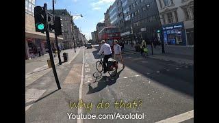 Cyclist rides toward a pedestrian who is crossing almost hitting then tries to blame the pedestrian