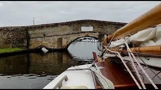 Sailing Yacht passing under Potter Heigham Bridge Norfolk Broads September 2022