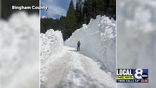 Crews work to clear snow from roads