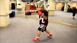 Boxing - Throwing Multiple Left Hooks Moving Forward