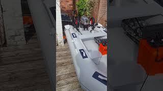 Inflatable boat fishing setup ready to go