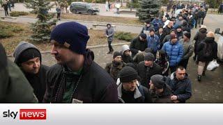 Ukraine Invasion Volunteers queue to join Ukrainian army