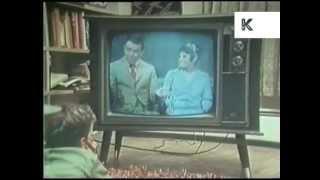 Late 60s early 70s boy watching television