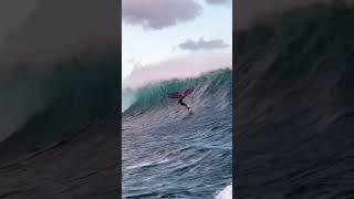 Wing foiling a crazy massive wave 