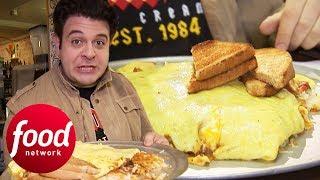 Adam Fights To Finish Enormous 12 Egg Omelette Challenge  Man v Food