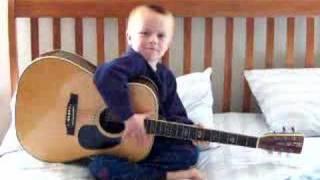 5 year-old plays guitar