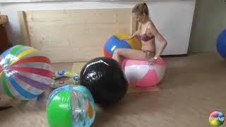 Deflating big beach balls