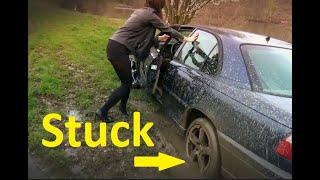 Girl Stuck in Mud with Car