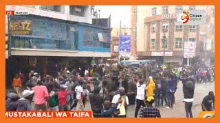 Anti-gov’t protesters escort a military truck with chants in Nairobi CBD