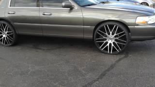 2004 Lincoln Towncar  sitting on 24 Spec-1 SPL- 001 Wheels with 25530-24 Lexani Tires.