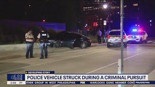 Police vehicle struck during criminal pursuit