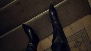 LadyIVE walks the stairs in leather boots