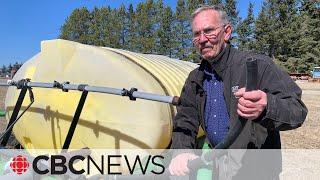 Farmer questions Alberta wildfire evacuation protocol