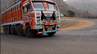 Tata Multi Axle and Ashok Leyland trucks taking a U turn