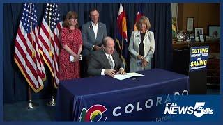 Colorado Governor Jared Polis signs property tax bill into law Wednesday