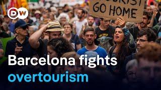 Behind Barcelonas fight against overtourism  DW News