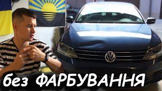 Видалення вмятини на капоті.