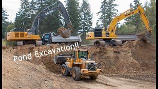 Excavators At Work Digging And Loading Dump Trucks For Earth Work Excavation Project