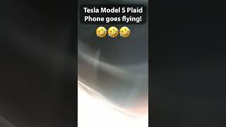 Mind-blowing Tesla Model S Plaid acceleration Phone flies out of kids hand