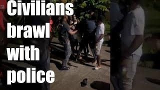 Civilians brawl with police in St. Vincent