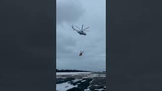 Mi-26 transporting Mi-8 after the emergency landing in Siberia. LANDING